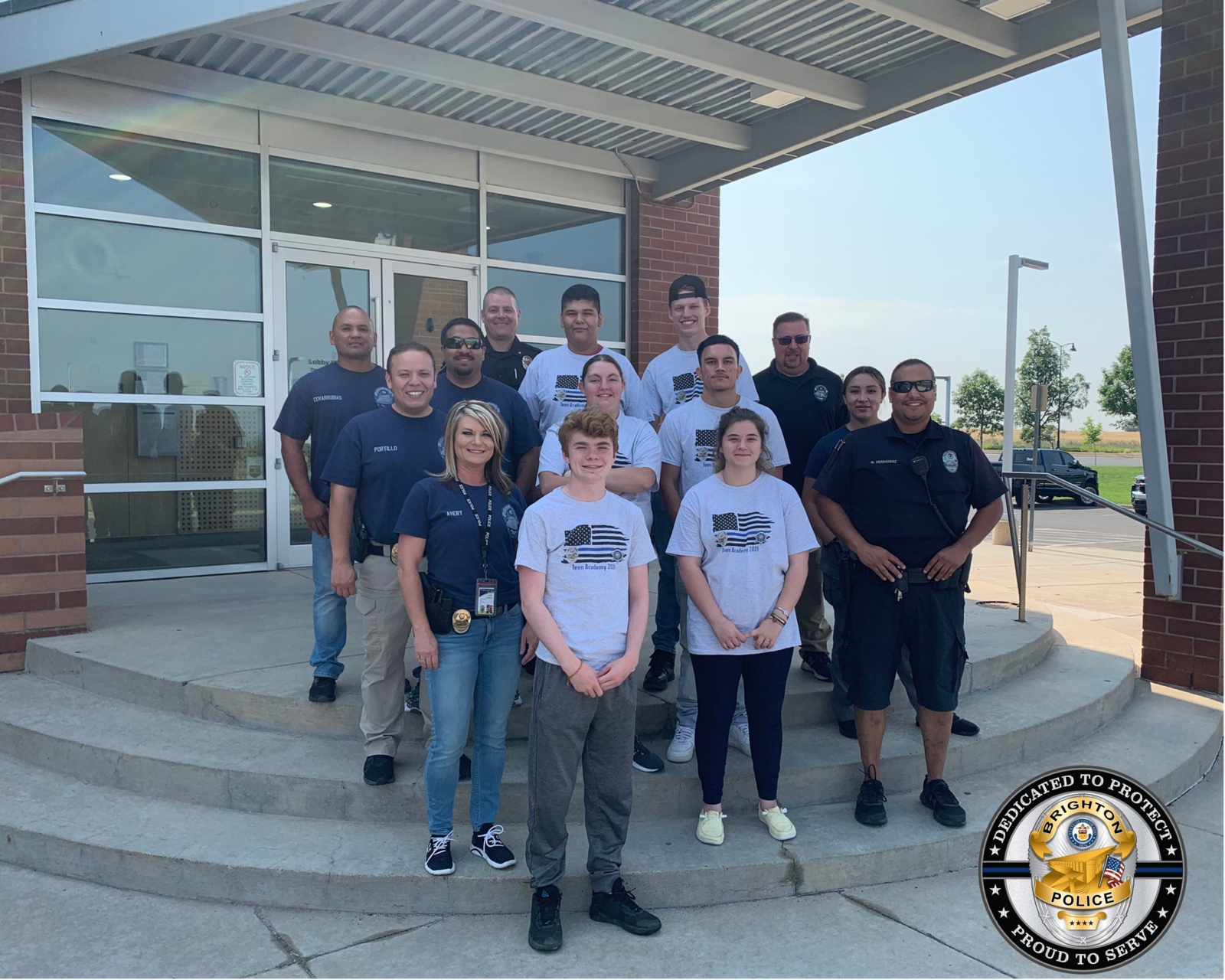 TEEN ACADEMY PHOTO- TEENS AND OFFICERS IN FRONT OF BPD