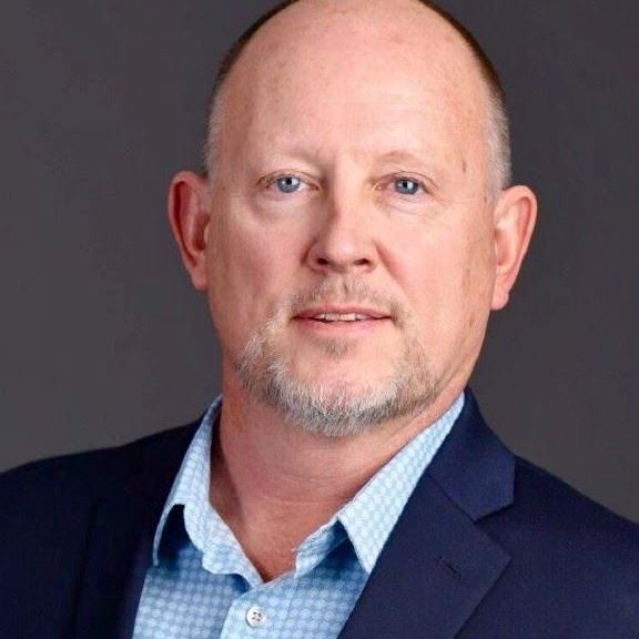 Headshot of man named Marv Falconburg