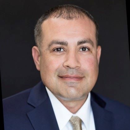 Headshot of man named Aaron Hererra