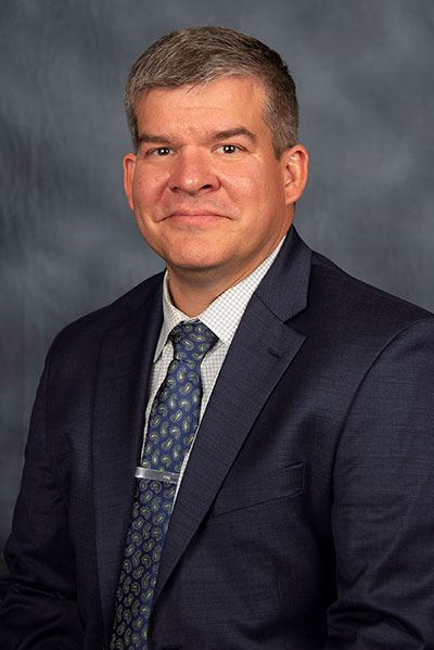 Headshot of Mike Domenighini