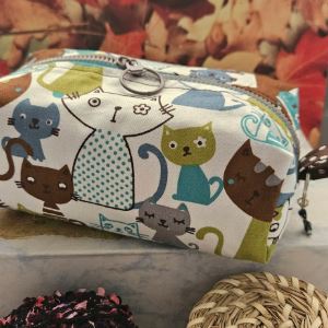Handmade cosmetics bag with a cartoon cat pattern.