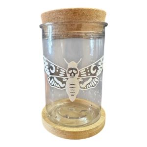 Clear jar with a design of a death's head moth on the side.