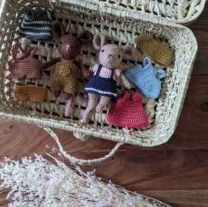 Basket with two crocheted plushie mice and an assortment of mouse outfits (aka mousefits). 