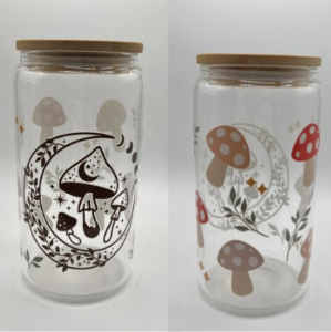 Two glass tumblers with various mushroom designs. 